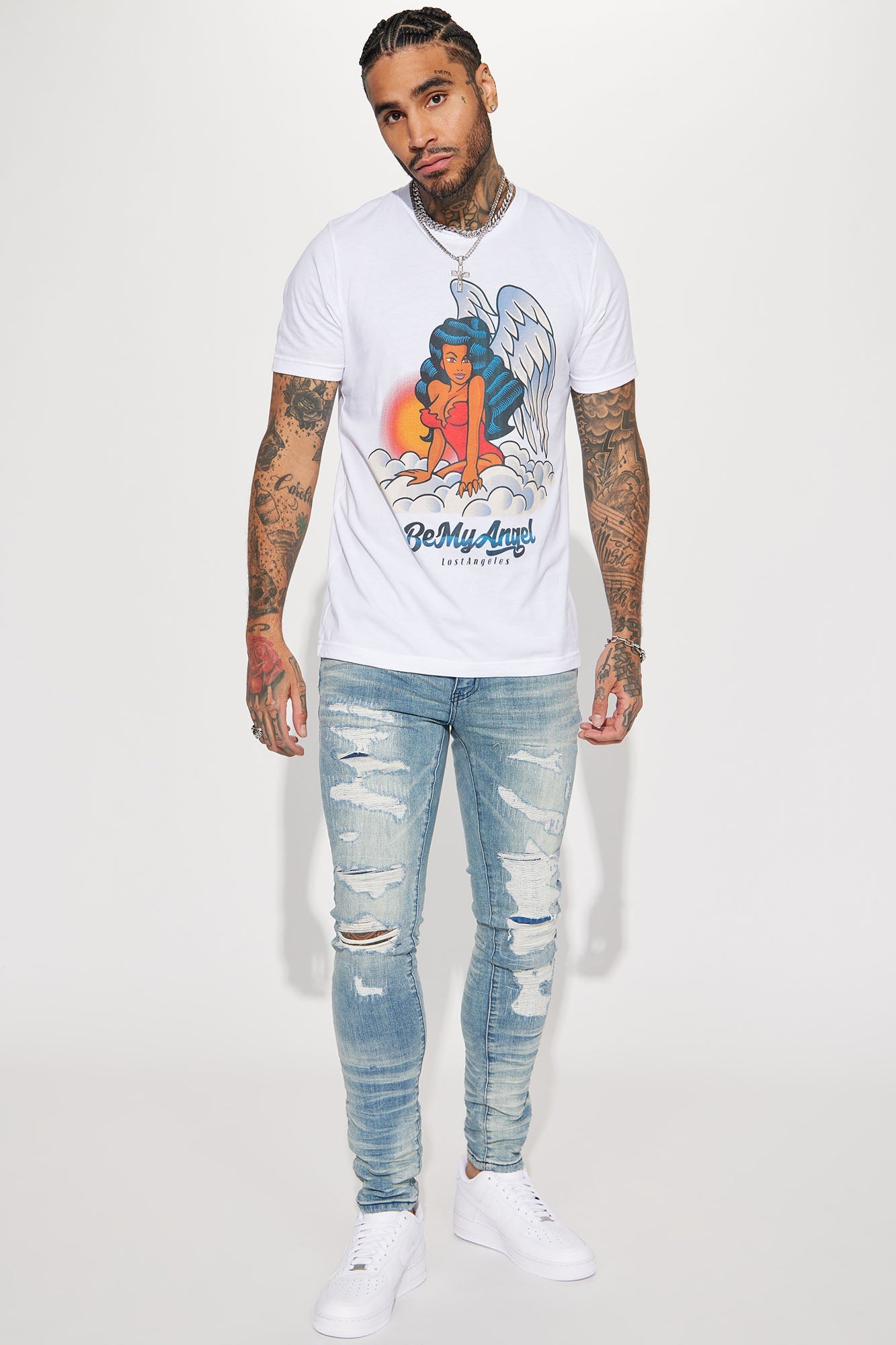 Fame Frenzy: Light Wash Paint-Spotted Stacked Skinny Jeans