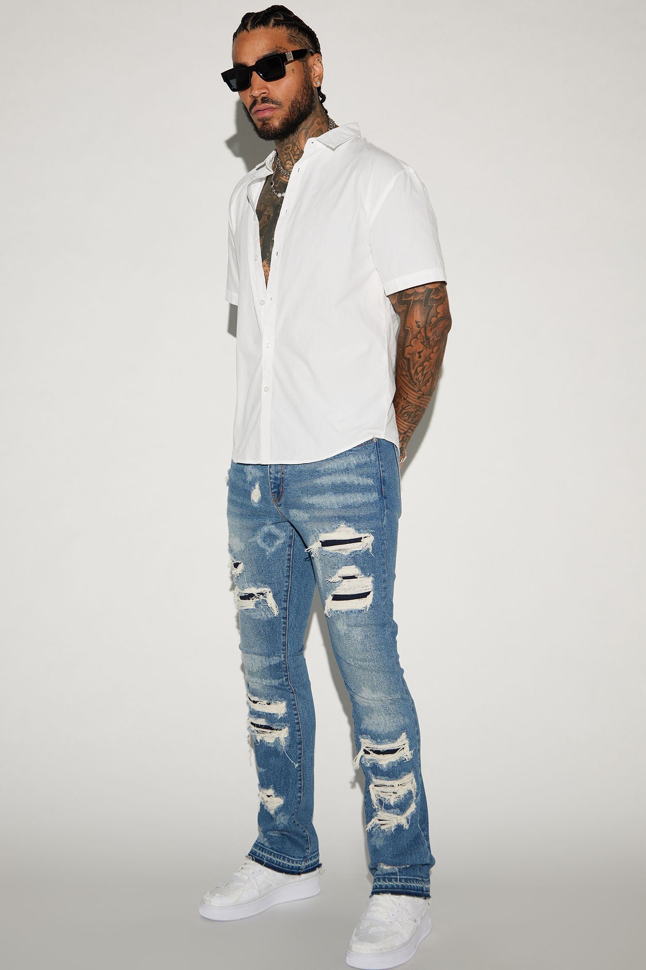 Get Cuffed in Style: Medium Wash Stacked Skinny Flared Jeans
