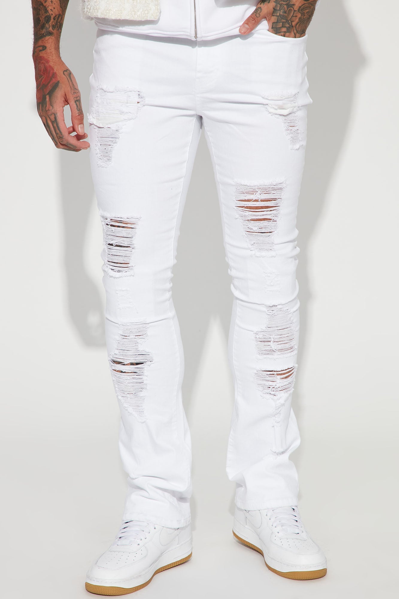 Boost Your Instagram Game with our 'For Likes' Stacked Skinny Flare Jeans in White