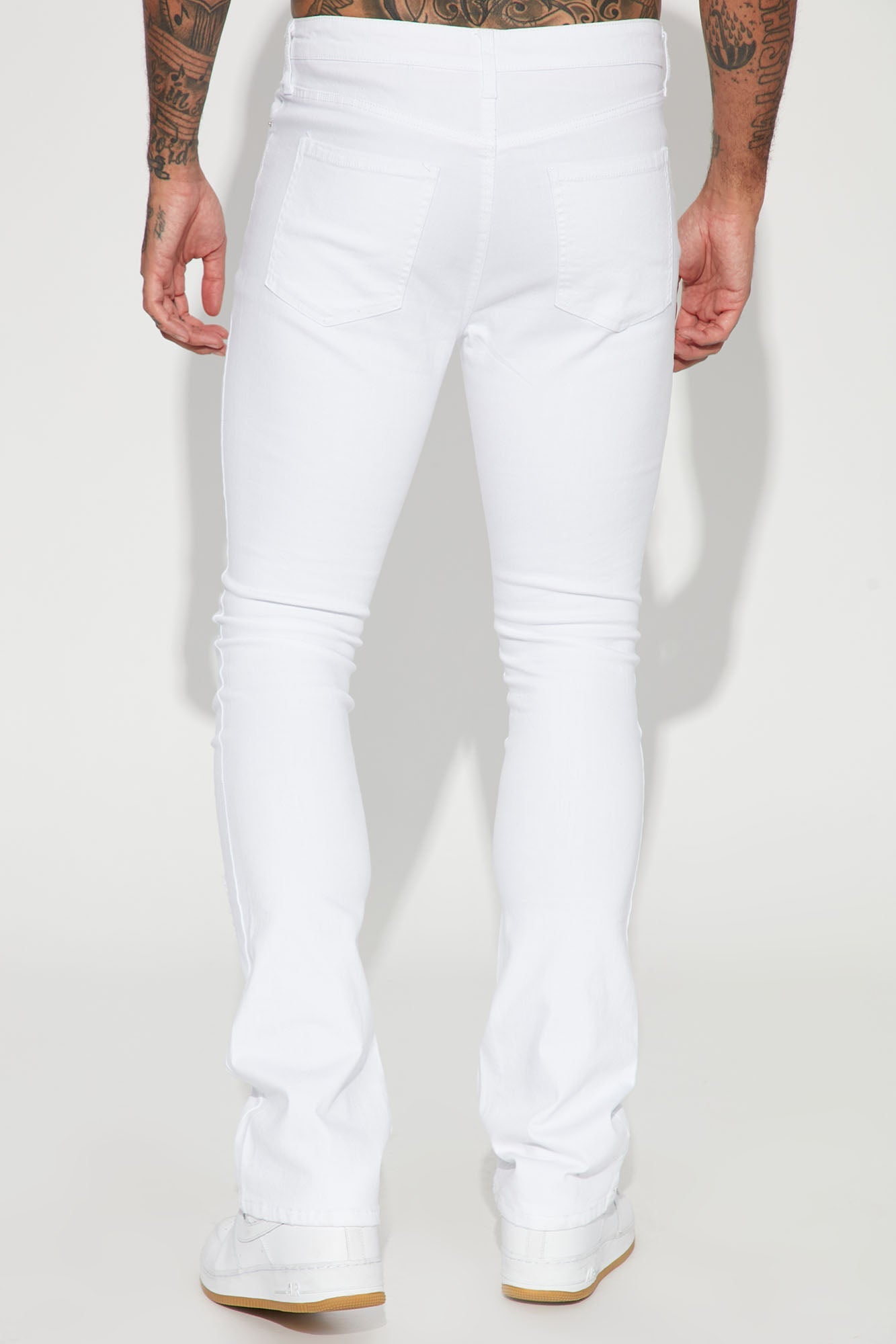 Boost Your Instagram Game with our 'For Likes' Stacked Skinny Flare Jeans in White