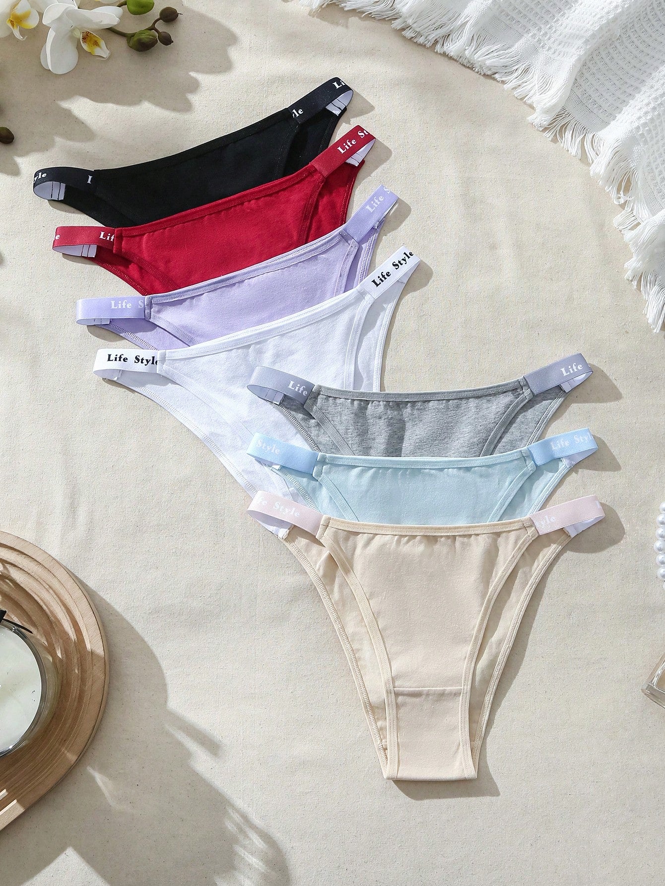 Solid Color Brazilian Bikini Bottoms With Embossed Letter Waistband