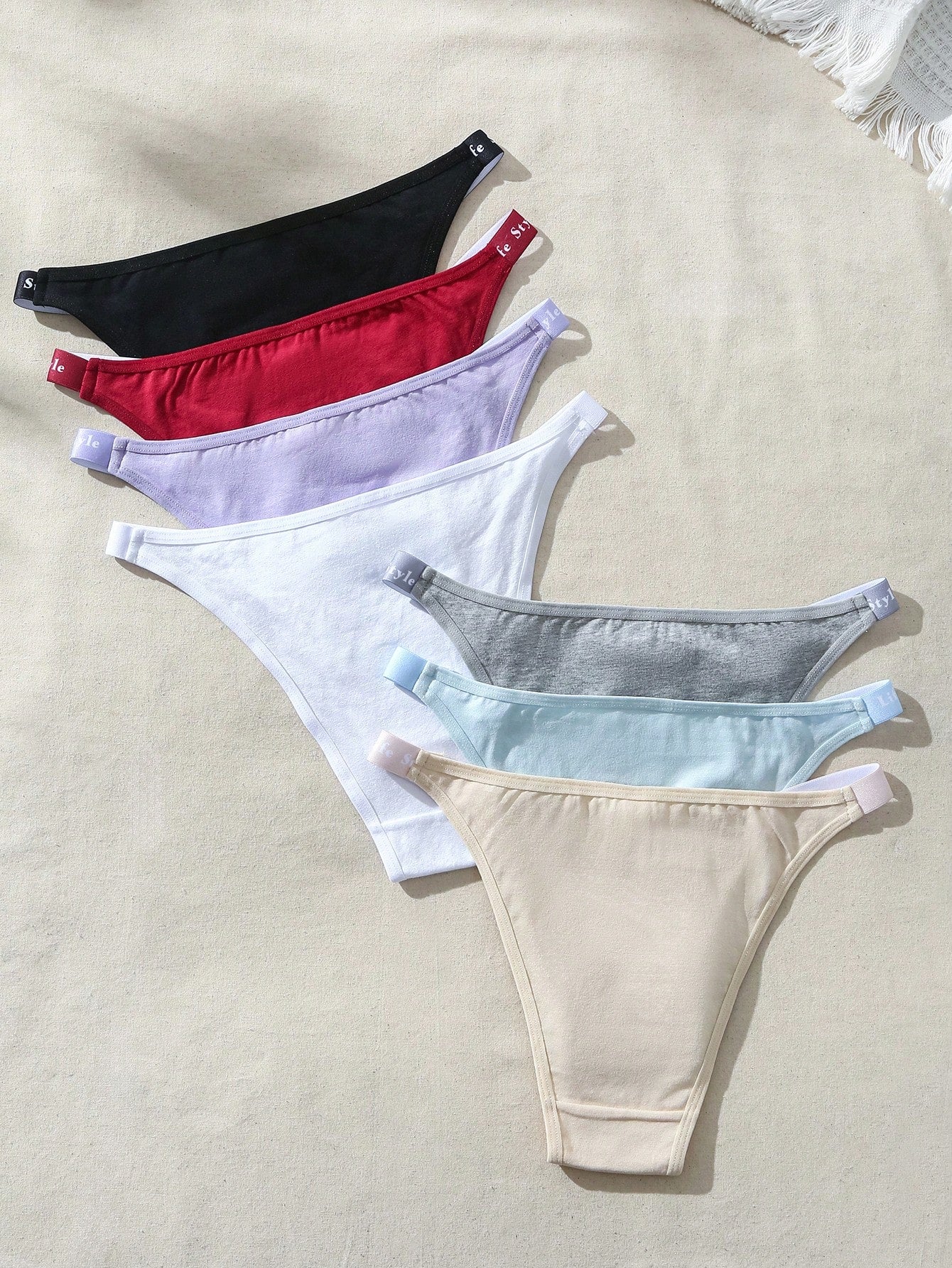 Solid Color Brazilian Bikini Bottoms With Embossed Letter Waistband