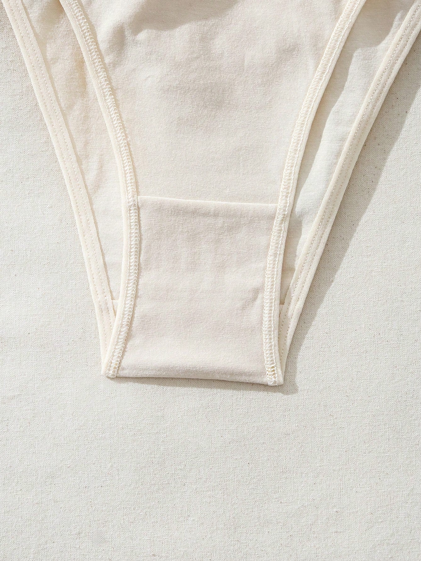 Solid Color Brazilian Bikini Bottoms With Embossed Letter Waistband