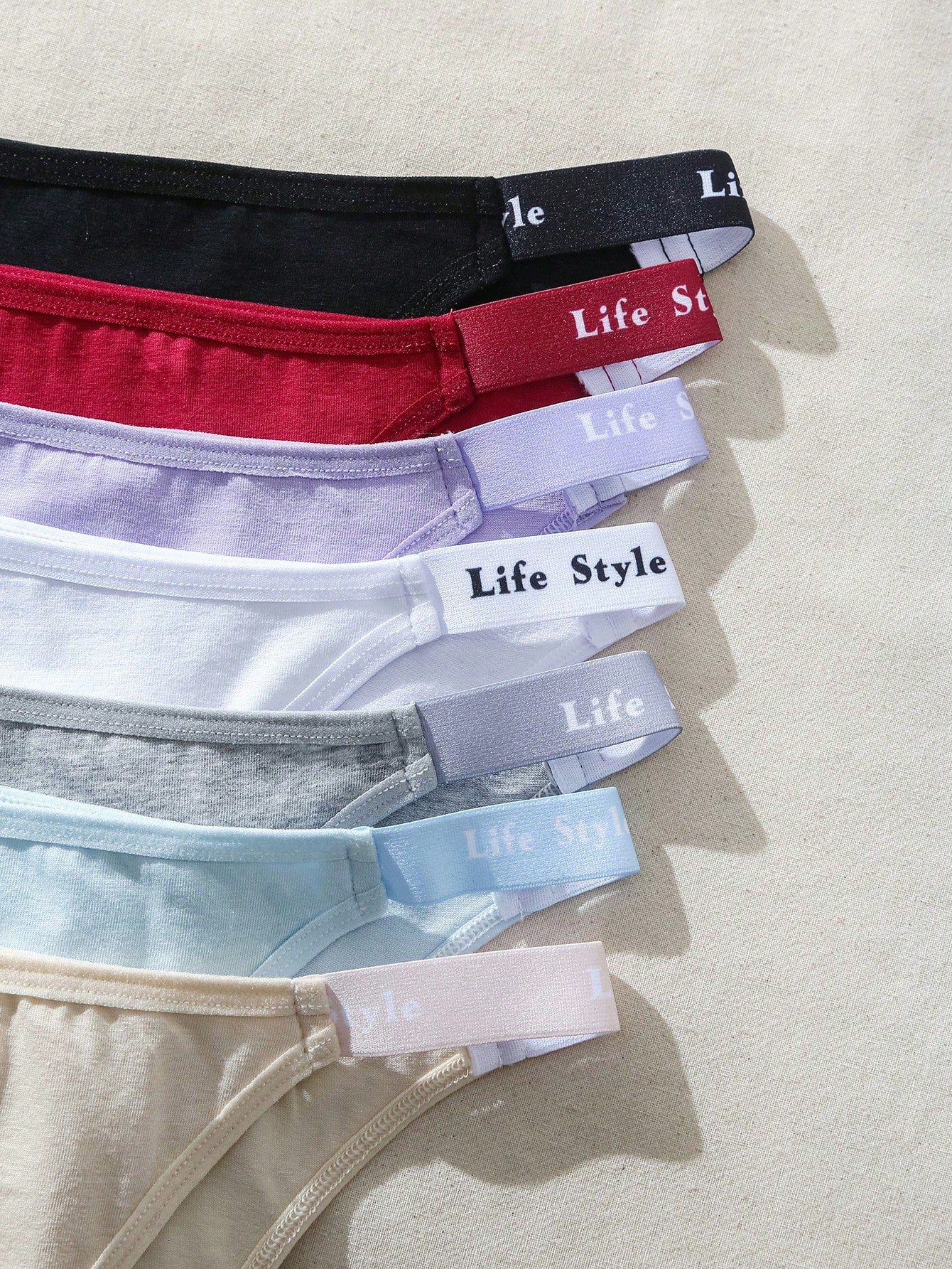 Solid Color Brazilian Bikini Bottoms With Embossed Letter Waistband