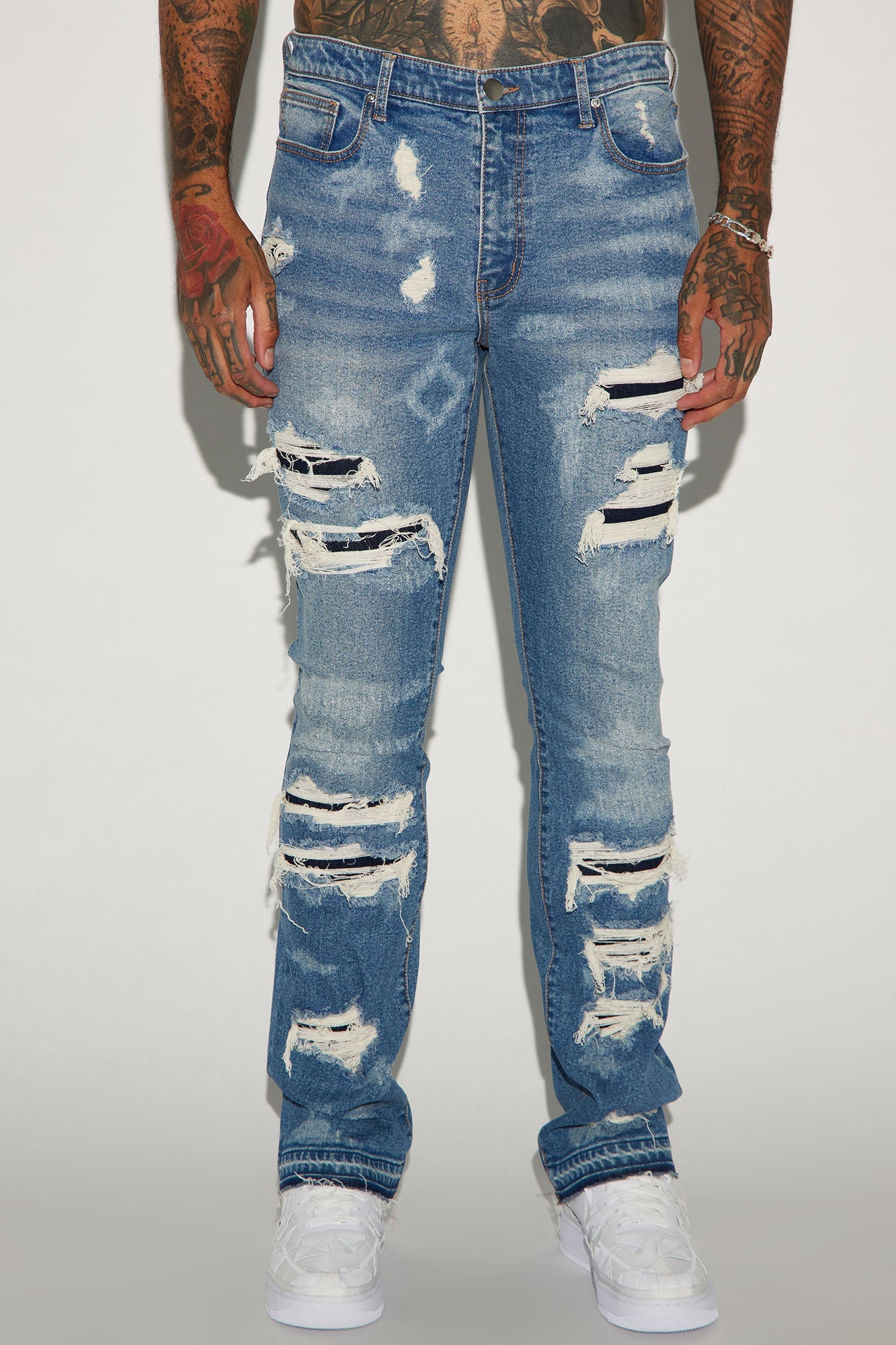 Get Cuffed in Style: Medium Wash Stacked Skinny Flared Jeans